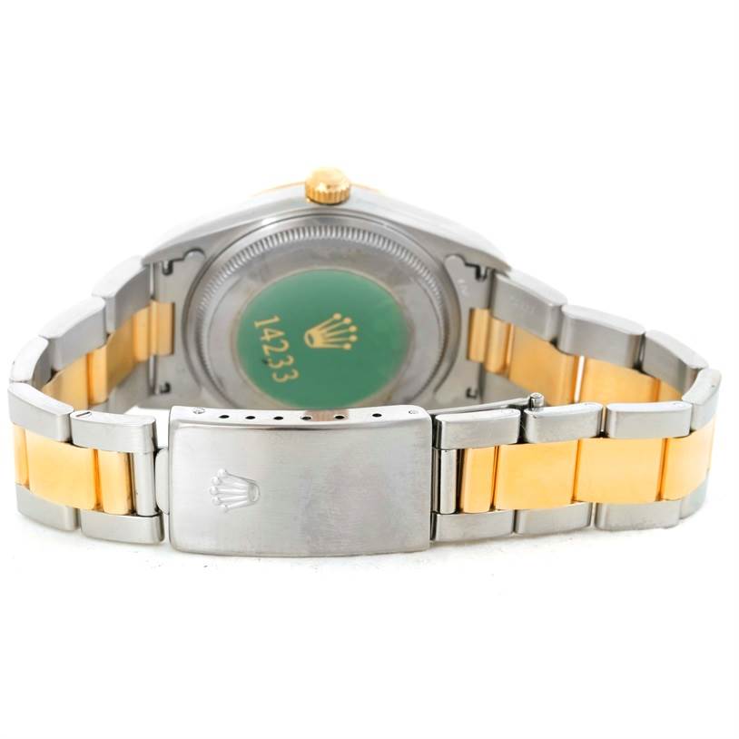 This image shows the back of a Rolex Oyster Perpetual 14233 Men's Steel and Gold (two tone) Grey Dial 14233 Men's Steel and Gold (two tone) Grey Dial watch, including the clasp, bracelet, and case back.
