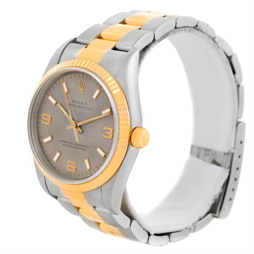 The image shows a Rolex Oyster Perpetual 14233 Men's Steel and Gold (two tone) Grey Dial 14233 Men's Steel and Gold (two tone) Grey Dial watch at a three-quarter angle, highlighting the dial, bezel, and bracelet.
