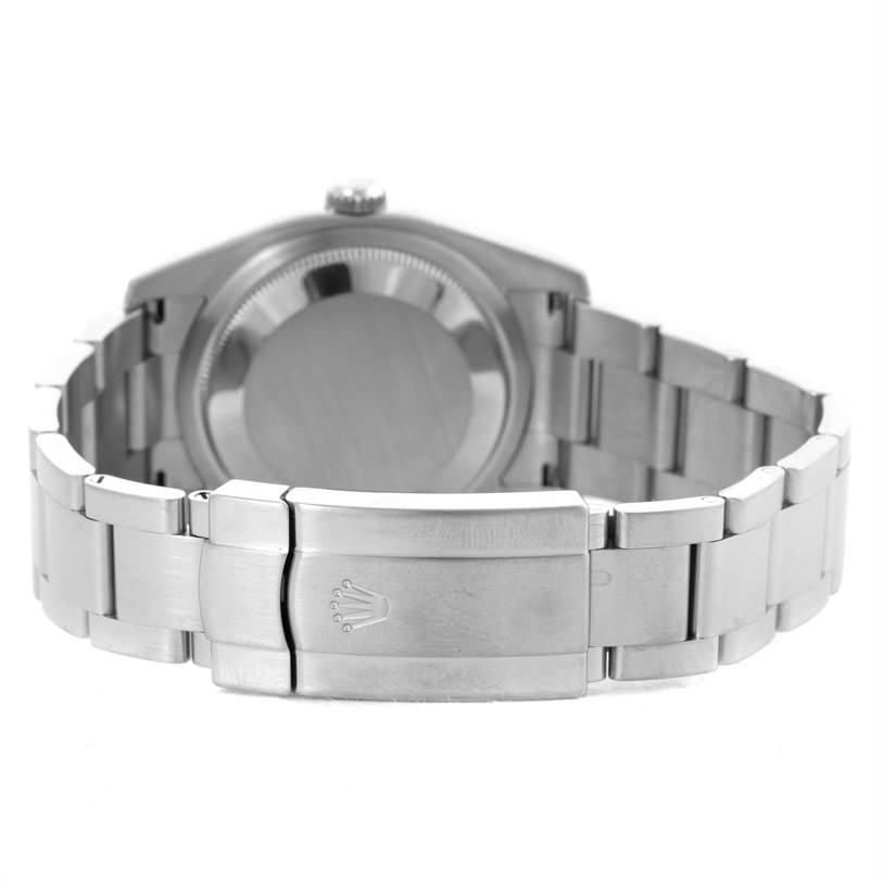 The image shows the back and clasp of a Rolex Oyster Perpetual 116000 Men's Black Dial 116000 Men's Black Dial watch.