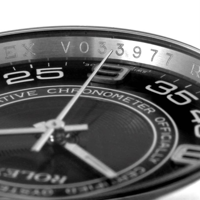 Close-up of a Rolex Oyster Perpetual 116000 Men's Black Dial 116000 Men's Black Dial showing part of the dial, hands, and the engraved serial number on the inner bezel.