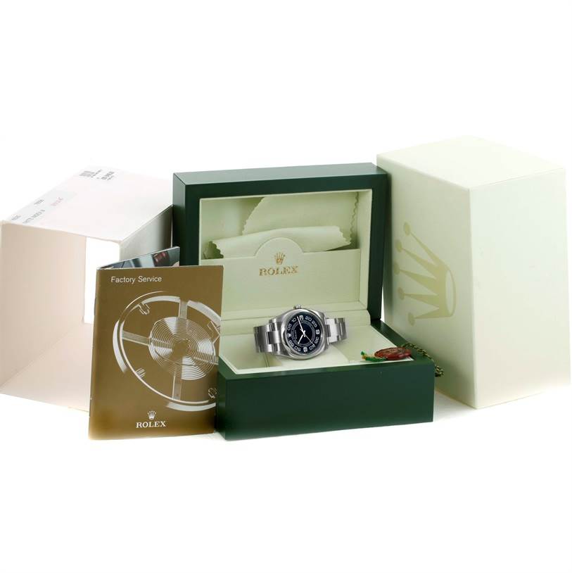 The image shows a Rolex Oyster Perpetual 116000 Men's Black Dial 116000 Men's Black Dial watch inside its green box, along with the warranty card and outer packaging.