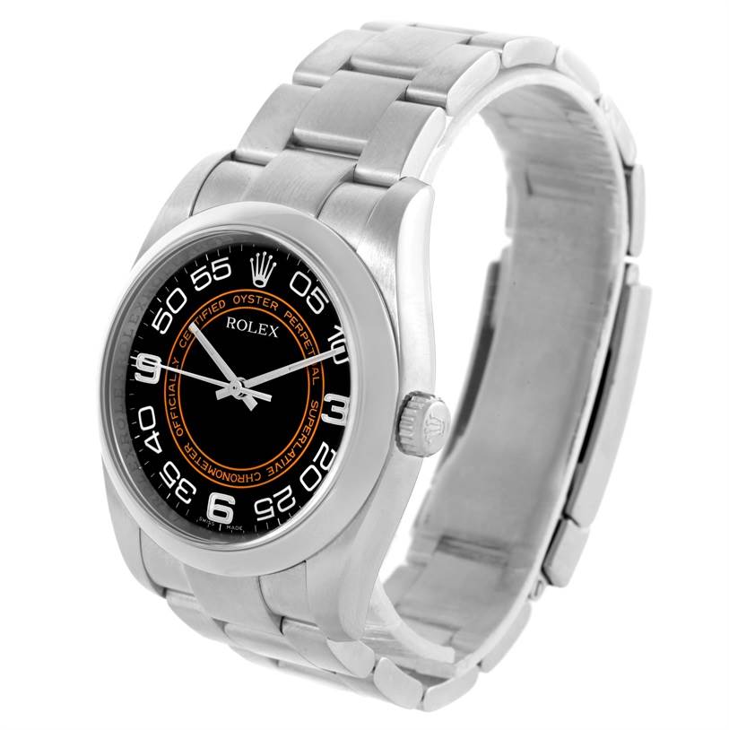 This Rolex Oyster Perpetual 116000 Men
s Stainless Steel Black Dial 116000 Men
s Stainless Steel Black Dial watch is shown at an angled top view, displaying its dial, bezel, crown, and bracelet.