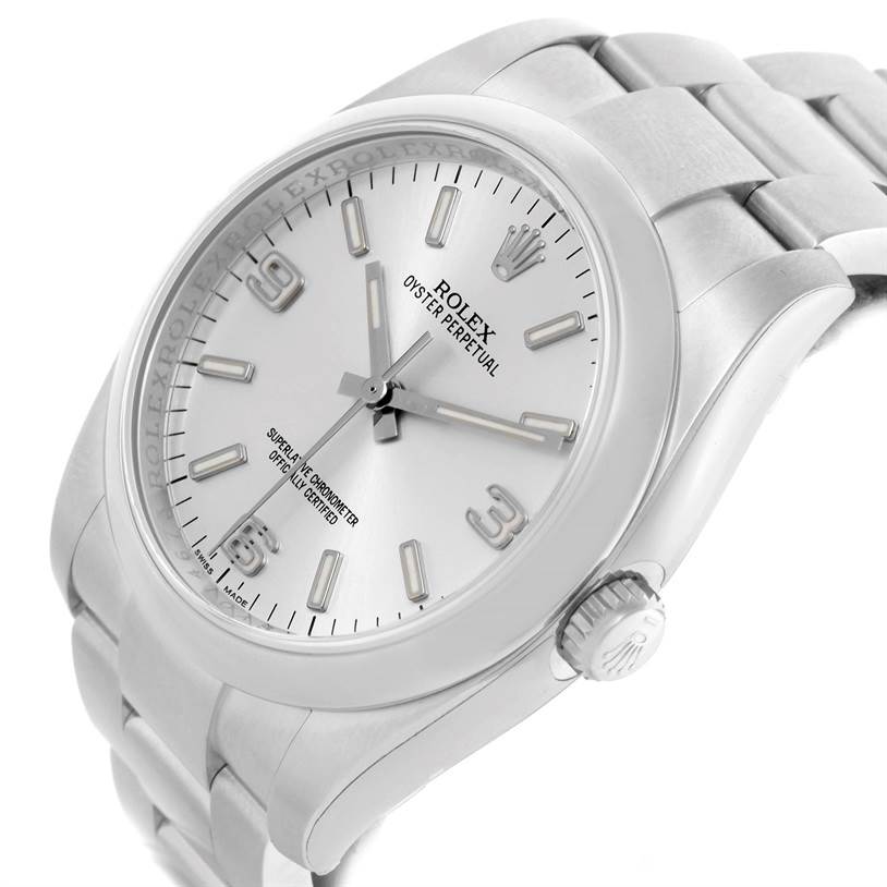 The image showcases a side-angle view of the Rolex Oyster Perpetual 116000 Men's Stainless Steel Silver Dial 116000 Men's Stainless Steel Silver Dial watch, highlighting the dial, bezel, crown, and bracelet.