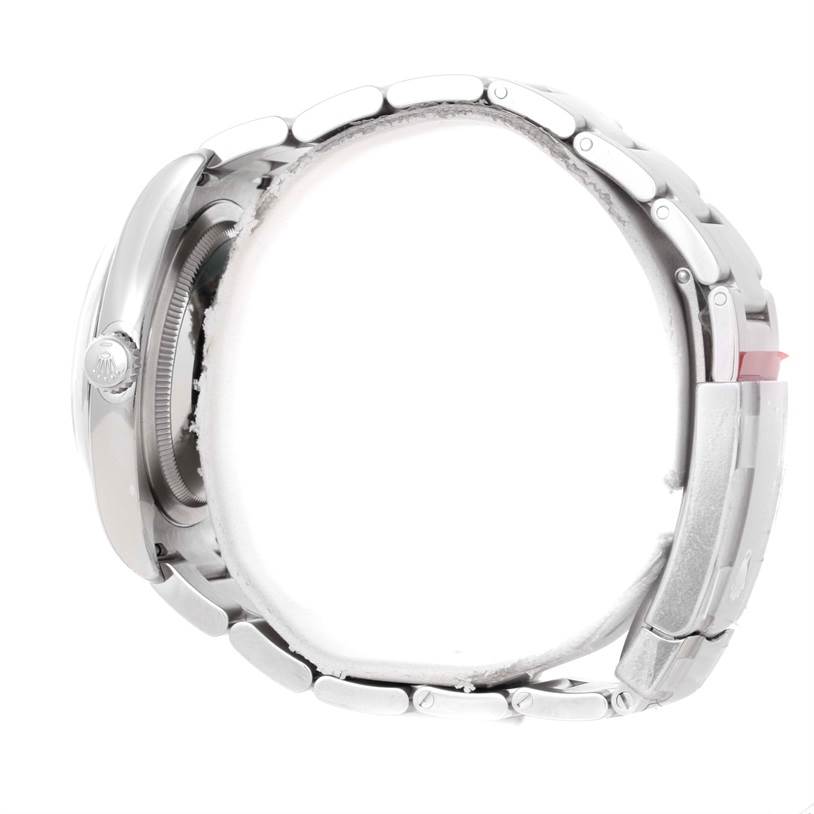 This image shows a side view of a Rolex Oyster Perpetual 116000 Men's Stainless Steel Silver Dial 116000 Men's Stainless Steel Silver Dial watch, highlighting the bracelet, crown, and case.