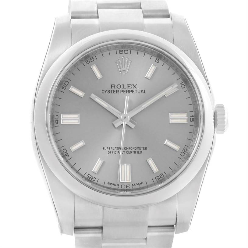 The image shows a front view of a Rolex Oyster Perpetual 116000 Stainless Steel Silver Dial 116000 Stainless Steel Silver Dial watch, highlighting its face, hands, and part of its bracelet.