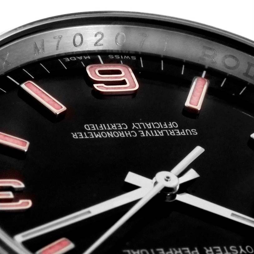 The image shows a close-up of the dial and bezel of a Rolex Oyster Perpetual 116000 Men's Stainless Steel Black Dial 116000 Men's Stainless Steel Black Dial watch, focusing on the hour markers and hands.