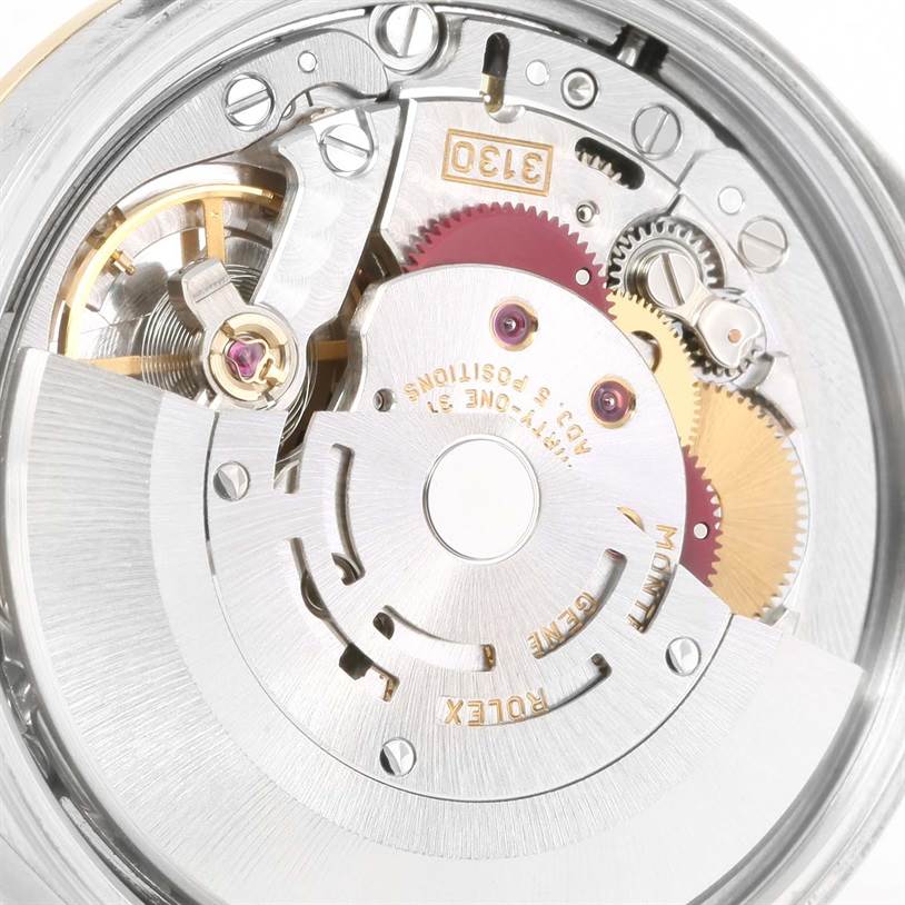 The image shows the internal mechanism and movement components of a Rolex Oyster Perpetual 14203 Men's Steel and Gold (two tone) Grey Dial 14203 Men's Steel and Gold (two tone) Grey Dial watch from a close-up angle.