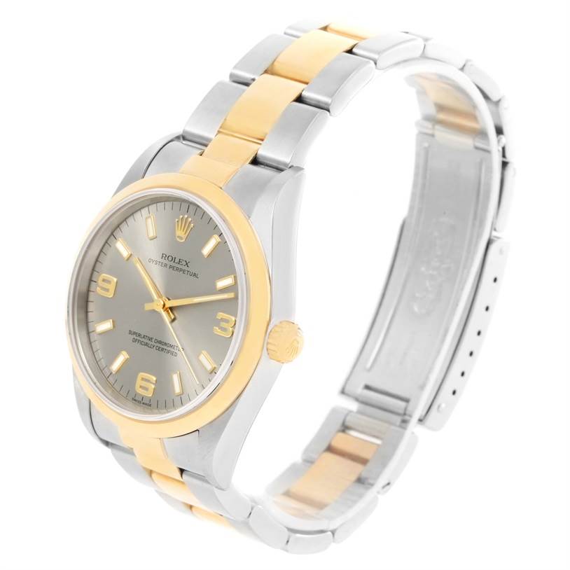 A Rolex Oyster Perpetual 14203 Men's Steel and Gold (two tone) Grey Dial 14203 Men's Steel and Gold (two tone) Grey Dial watch, viewed at an angle showing the face, bezel, crown, and two-tone bracelet.