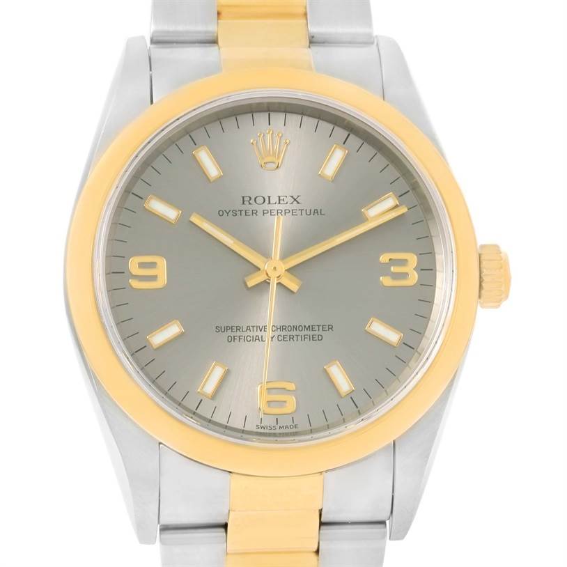 This image shows a front view of a Rolex Oyster Perpetual 14203 Men's Steel and Gold (two tone) Grey Dial 14203 Men's Steel and Gold (two tone) Grey Dial watch, highlighting its face, bezel, and bracelet.