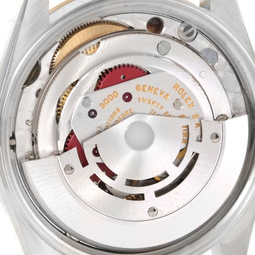 This is an image showing the inner mechanism or movement of a Rolex Oyster Perpetual 14203 Men
s Steel and Gold (two tone) Champagne Dial 14203 Men
s Steel and Gold (two tone) Champagne Dial watch.