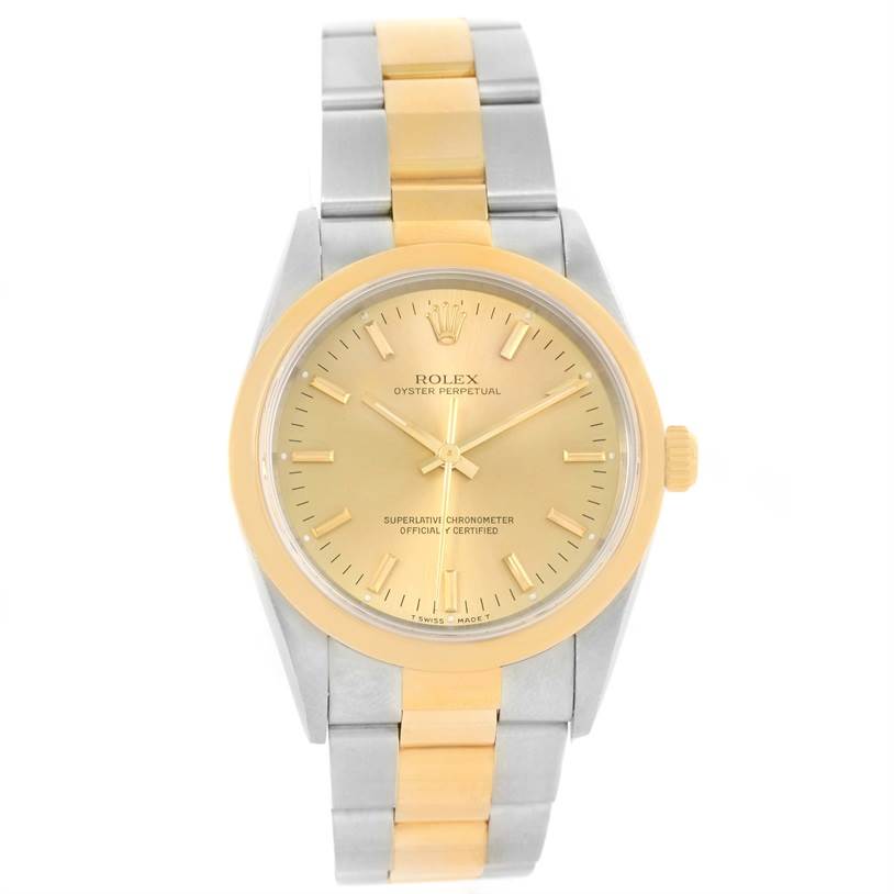 This Rolex Oyster Perpetual 14203 Men
s Steel and Gold (two tone) Champagne Dial 14203 Men
s Steel and Gold (two tone) Champagne Dial watch is shown from a front angle, displaying the face, bezel, crown, and bracelet.