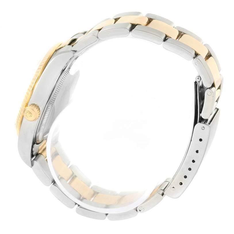 The image shows a side profile of a Rolex Oyster Perpetual 14233 Men's Steel and Gold (two tone) Grey Dial 14233 Men's Steel and Gold (two tone) Grey Dial watch, focusing on the case, crown, and metal bracelet with a two-tone finish.