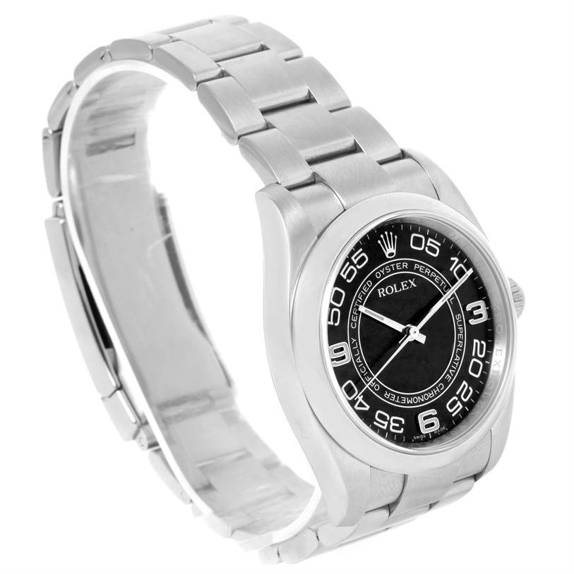 The Rolex Oyster Perpetual 116000 Men's Stainless Steel Black Dial 116000 Men's Stainless Steel Black Dial watch is shown at a slight angled view, displaying its face, bezel, and bracelet.