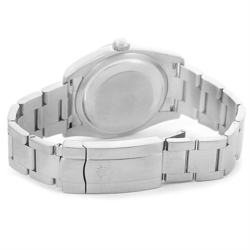 The image shows the back view of a Rolex Oyster Perpetual 116034 Men
s Stainless Steel Blue Dial 116034 Men
s Stainless Steel Blue Dial watch, highlighting its case back, bracelet, and clasp.