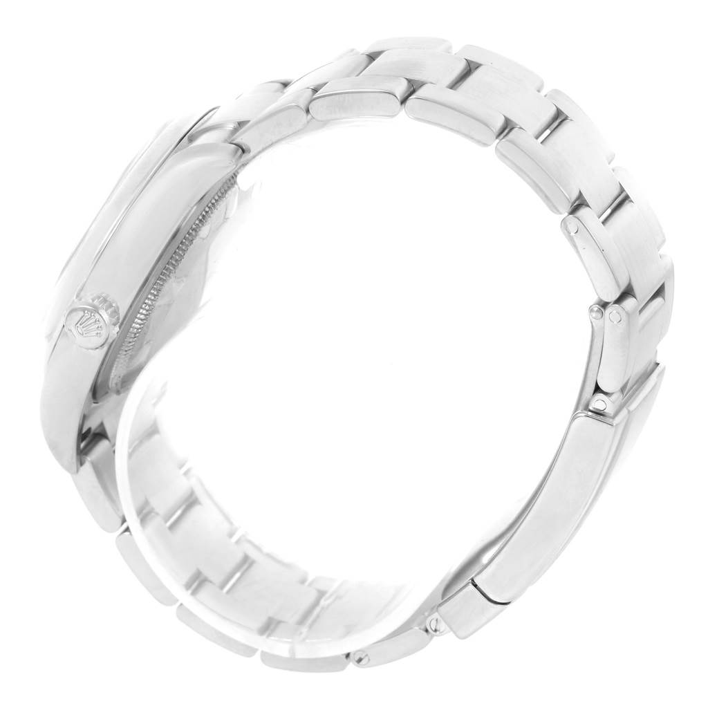 This side-angle view of the Rolex Oyster Perpetual 116000 Men's Stainless Steel Black Dial 116000 Men's Stainless Steel Black Dial shows the bracelet and part of the watch case, highlighting the clasp.