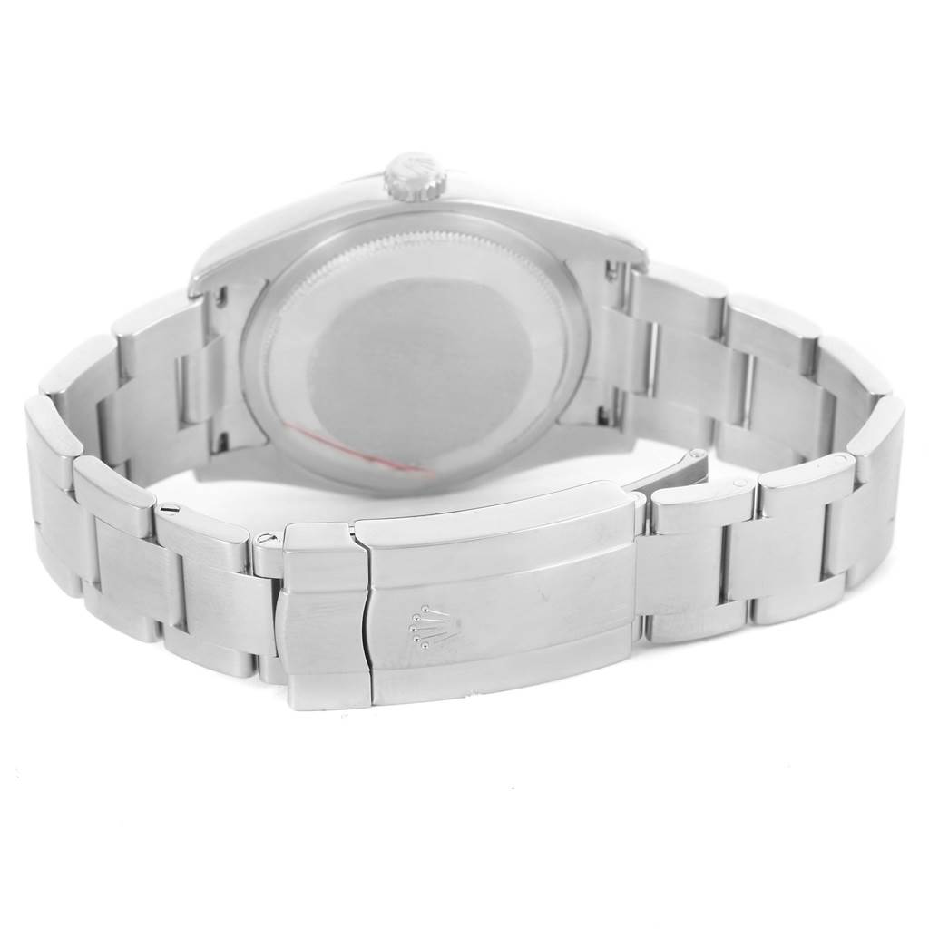 The image shows the back case and bracelet clasp of a Rolex Oyster Perpetual 116000 Men's Stainless Steel Black Dial 116000 Men's Stainless Steel Black Dial watch.