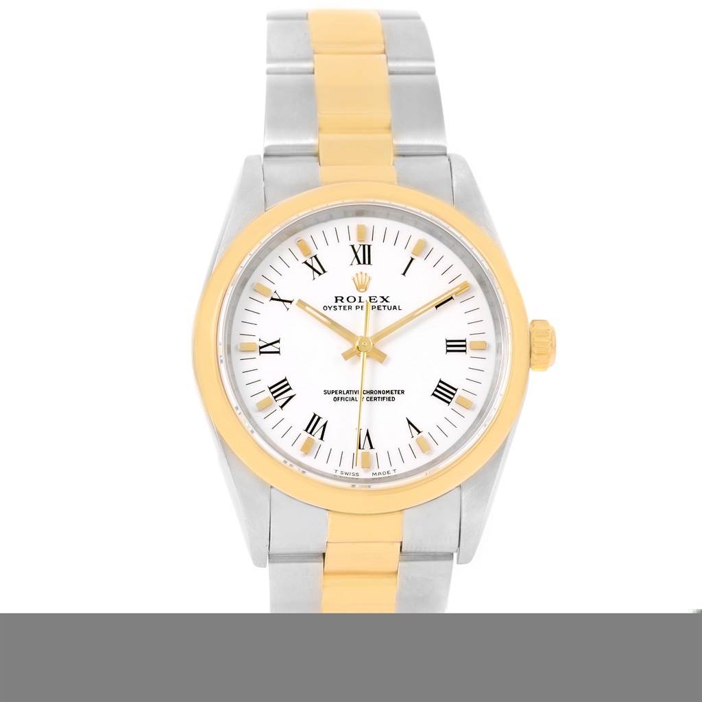 This image shows a front view of a Rolex Oyster Perpetual 14203 Men
s Steel and Gold (two tone) White Dial 14203 Men
s Steel and Gold (two tone) White Dial watch with a two-tone metal bracelet and a white dial.