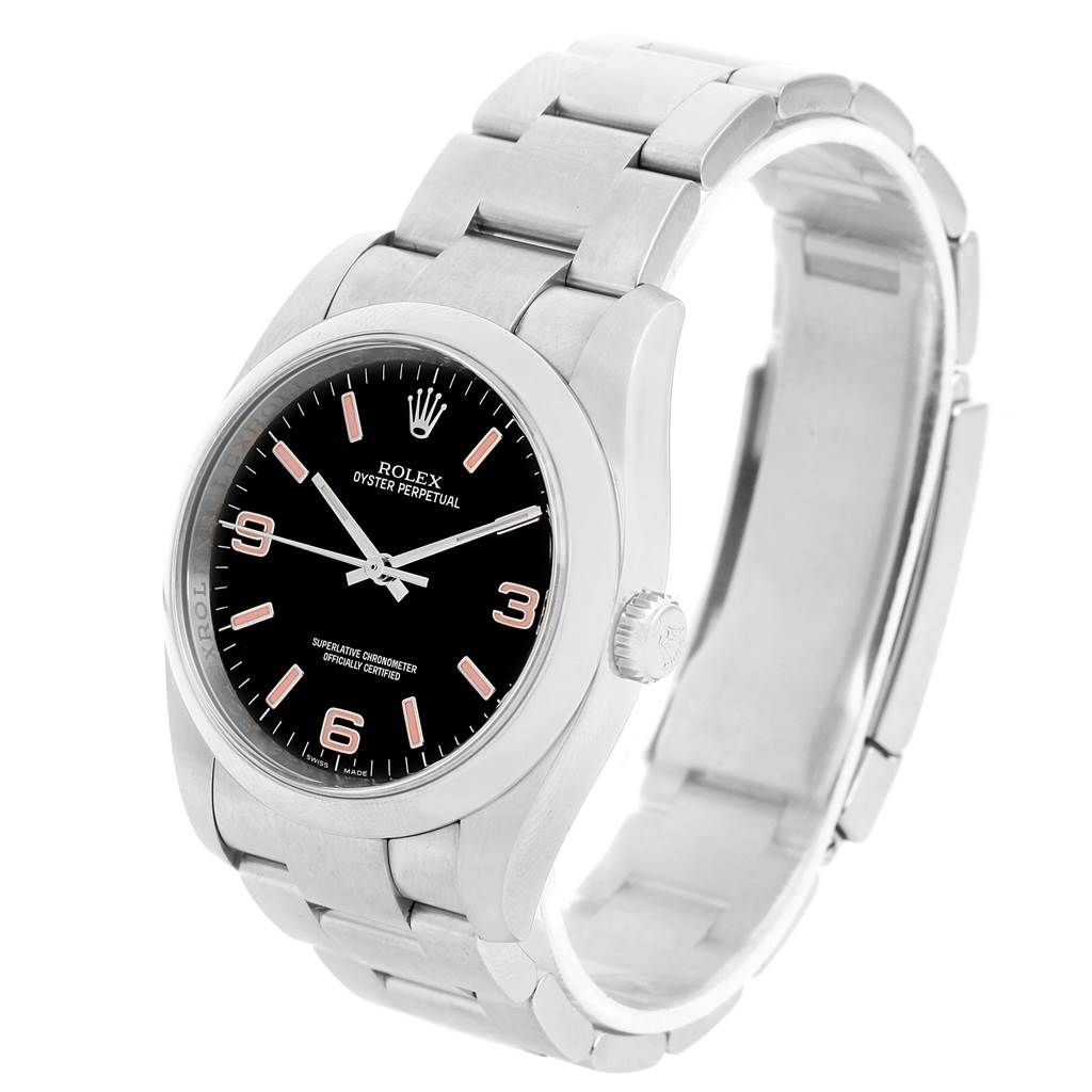 The image shows a Rolex Oyster Perpetual 116000 Men's Stainless Steel Black Dial 116000 Men's Stainless Steel Black Dial watch from a slight side angle, highlighting the face, bezel, and bracelet.