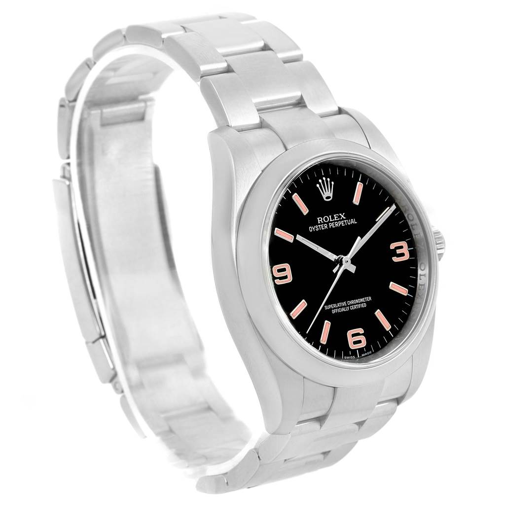 The Rolex Oyster Perpetual 116000 Men's Stainless Steel Black Dial 116000 Men's Stainless Steel Black Dial watch is shown at a front-left angle, highlighting the bracelet, case, dial, and crown.