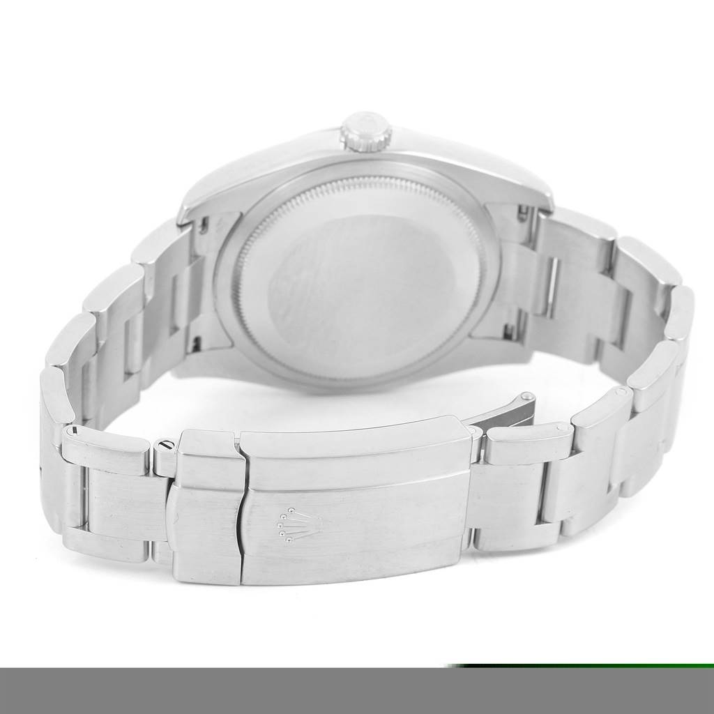 This image shows the back case and clasp of a Rolex Oyster Perpetual 116000 Men's Stainless Steel Black Dial 116000 Men's Stainless Steel Black Dial watch from a rear angle.