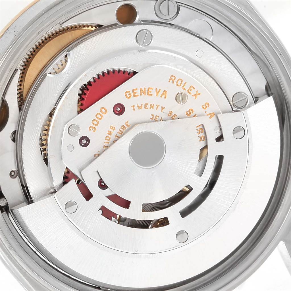 The image shows a close-up view of the movement mechanism inside a Rolex Oyster Perpetual 14233 Men's Steel and Gold (two tone) Champagne Dial 14233 Men's Steel and Gold (two tone) Champagne Dial watch.