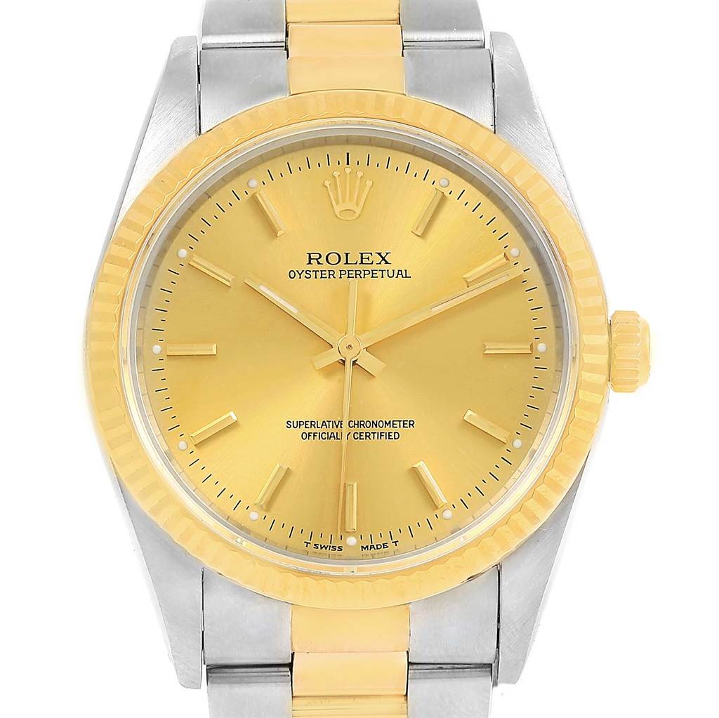The image shows a front view of a Rolex Oyster Perpetual 14233 Men's Steel and Gold (two tone) Champagne Dial 14233 Men's Steel and Gold (two tone) Champagne Dial watch with a gold dial and a two-tone bracelet.