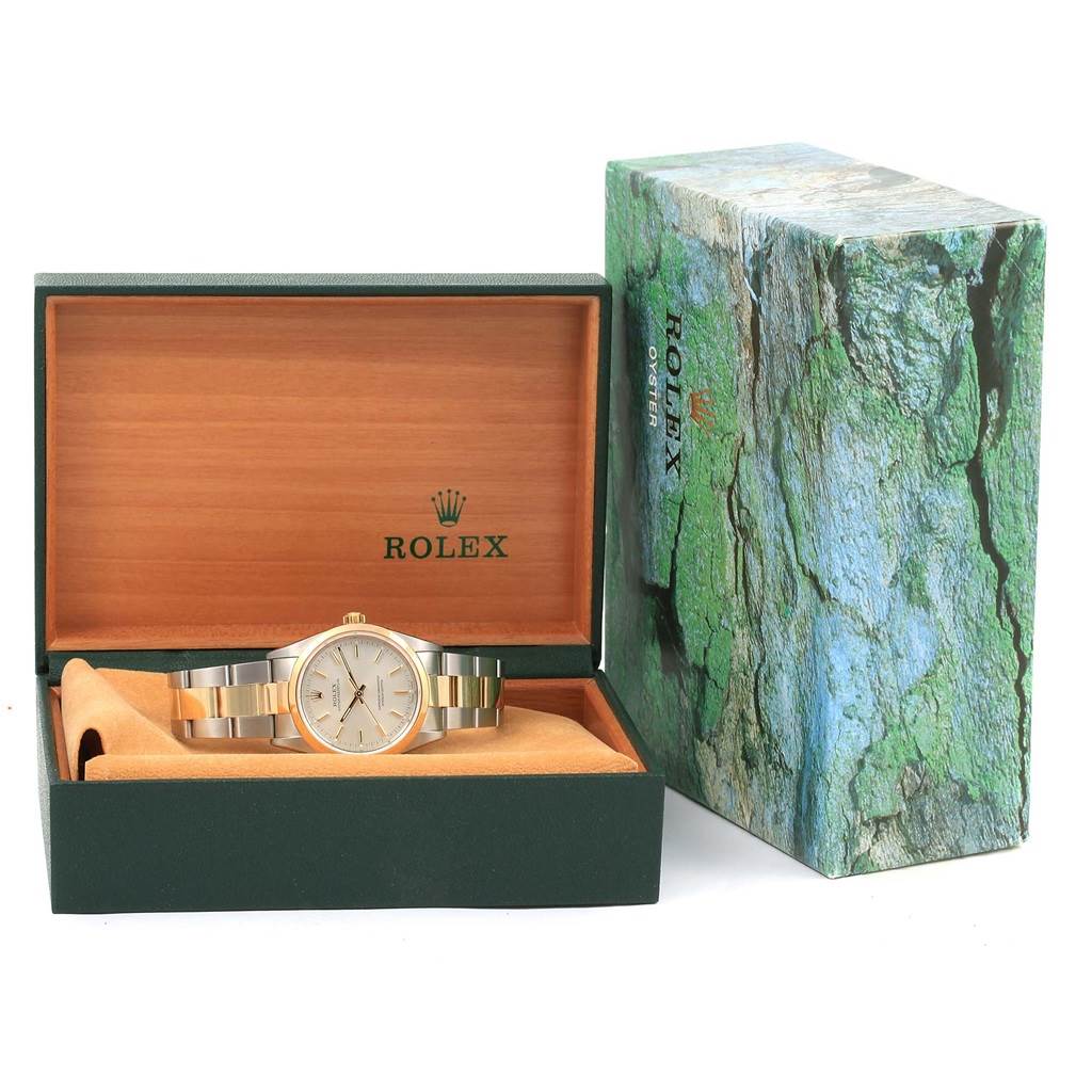 The image shows a Rolex Oyster Perpetual 14203 Men's Steel and Gold (two tone) Silver Dial 14203 Men's Steel and Gold (two tone) Silver Dial watch facing forward in its open box, with the outer box visible beside it.