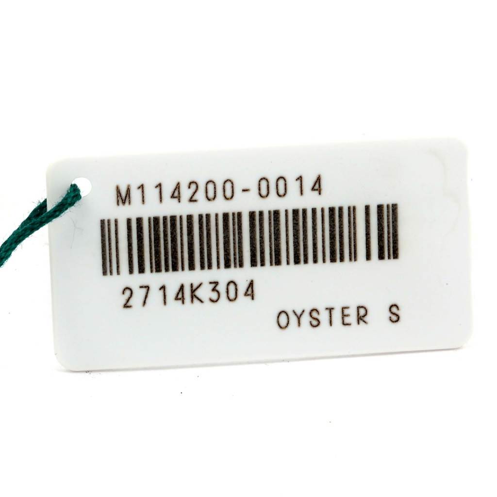 The image shows a tag for the Rolex Oyster Perpetual 114200 Stainless Steel Blue Dial 114200 Stainless Steel Blue Dial model with a barcode and serial numbers.