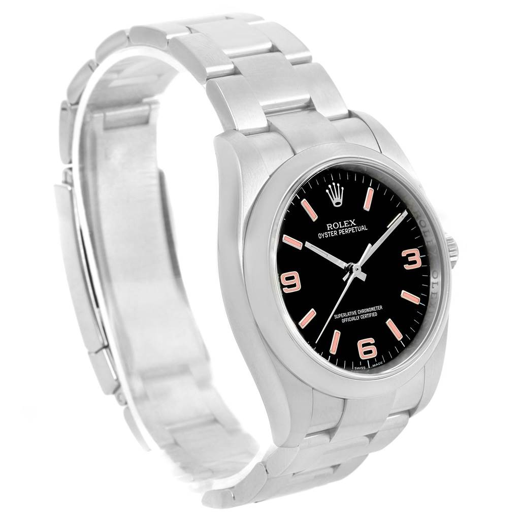 This image shows a Rolex Oyster Perpetual 116000 Men's Stainless Steel Black Dial 116000 Men's Stainless Steel Black Dial watch from a three-quarter angle, highlighting the dial, bezel, and part of the bracelet.