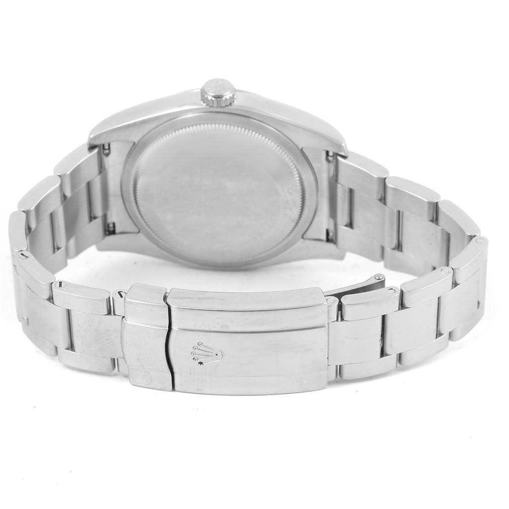 This image shows the back view of a Rolex Oyster Perpetual 116000 Men's Stainless Steel Black Dial 116000 Men's Stainless Steel Black Dial watch, featuring the case back and stainless steel bracelet with clasp.