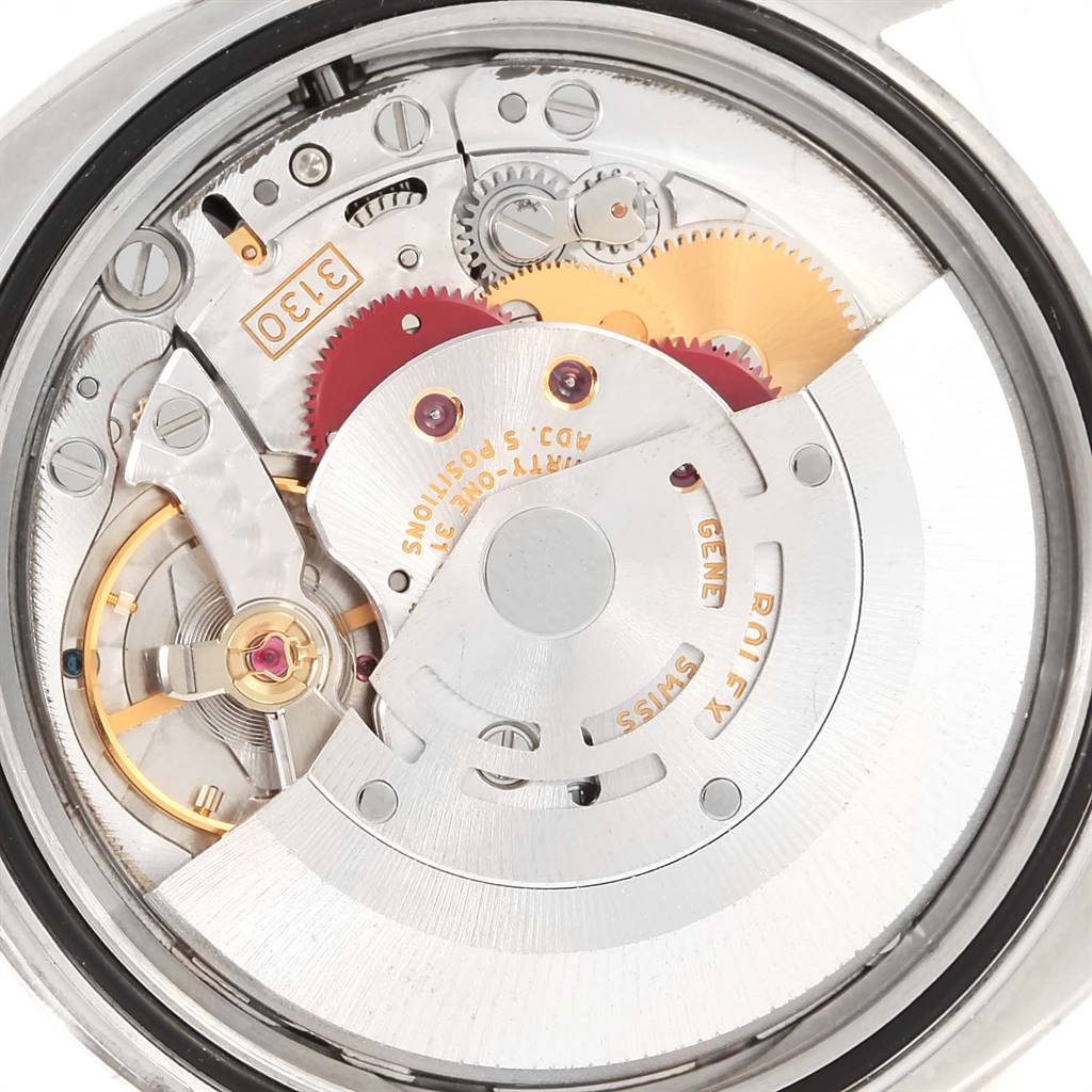 This image shows the internal mechanism of a Rolex Oyster Perpetual 116000 Men
s Stainless Steel Black Dial 116000 Men
s Stainless Steel Black Dial watch from a close-up, top-down angle.