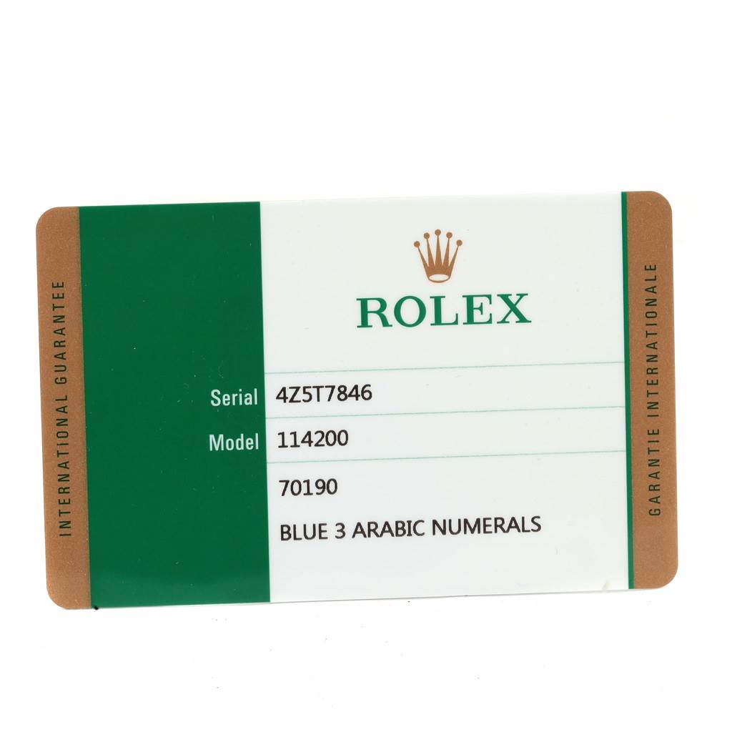 This image shows a warranty card for the Rolex Oyster Perpetual 114200 Men's Stainless Steel Blue Dial 114200 Men's Stainless Steel Blue Dial model 114200.