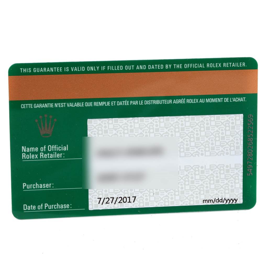 This image shows the guarantee card for a Rolex Oyster Perpetual 114200 Stainless Steel Silver Dial 114200 Stainless Steel Silver Dial watch at a straight angle.