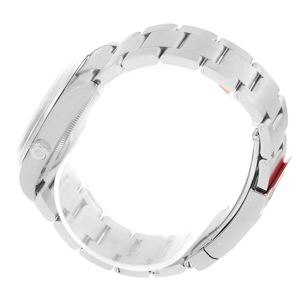 The image shows the side view of the Rolex Oyster Perpetual 114200 Stainless Steel Silver Dial 114200 Stainless Steel Silver Dial’s stainless steel bracelet and clasp.