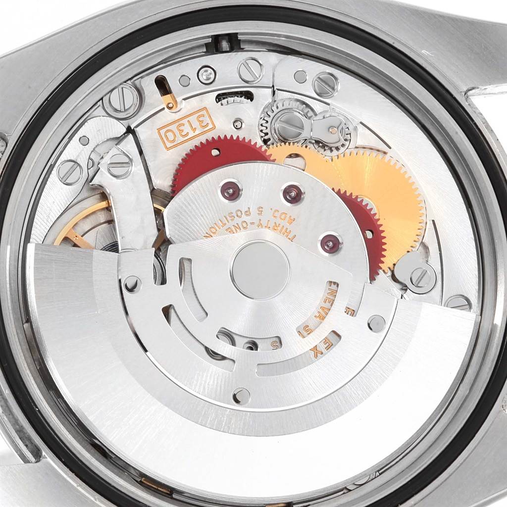 This image shows the internal mechanism of an Oyster Perpetual Rolex watch from a top-down angle.