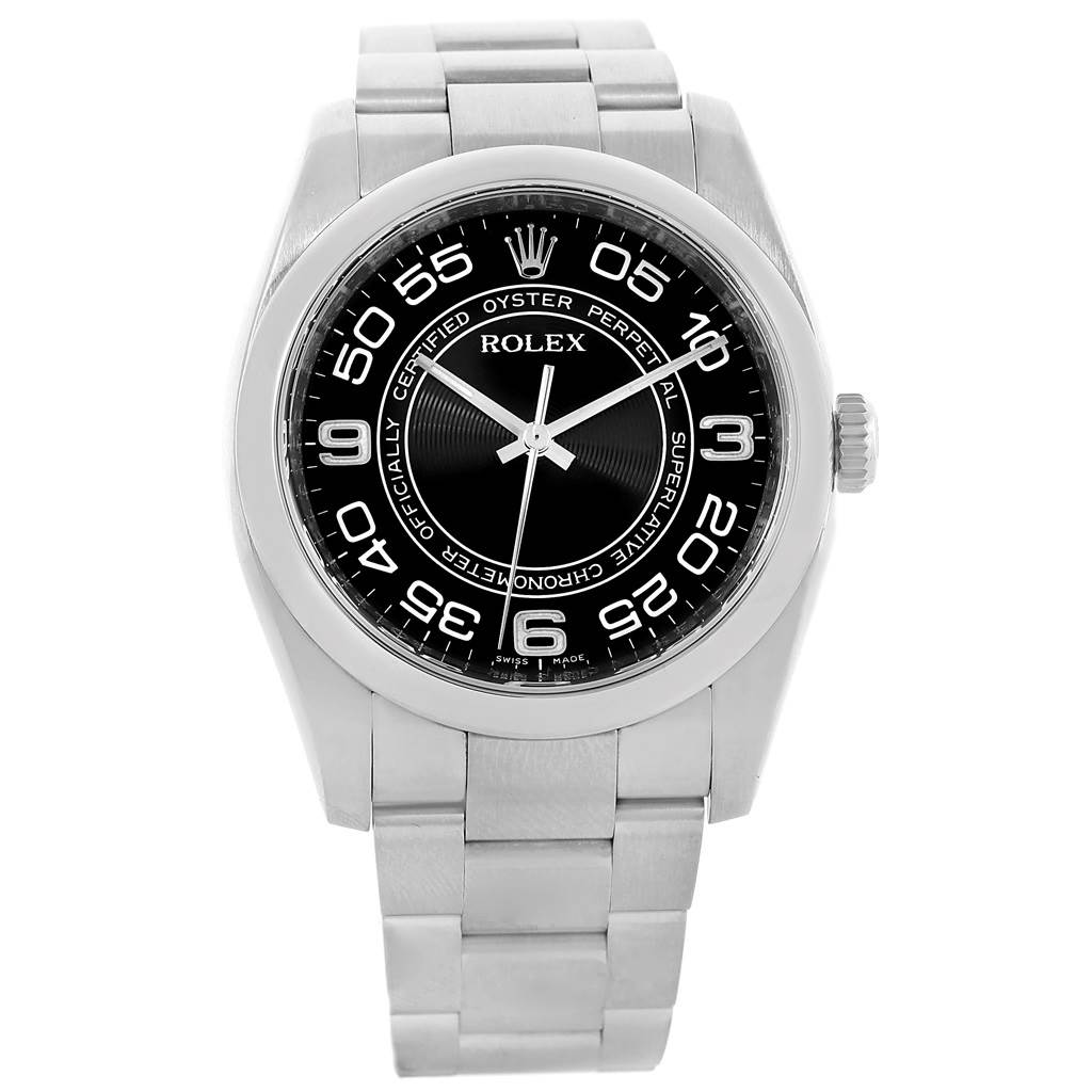 The image shows a front view of the Rolex Oyster Perpetual 116000 Men's Stainless Steel Black Dial 116000 Men's Stainless Steel Black Dial watch, featuring its dial, bezel, and bracelet.