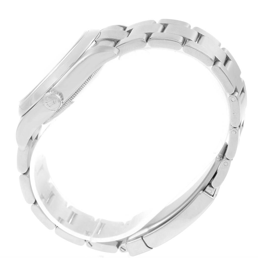 The image shows a side view of the case and bracelet of a Rolex Oyster Perpetual 116000 Men's Stainless Steel Silver Dial 116000 Men's Stainless Steel Silver Dial watch.