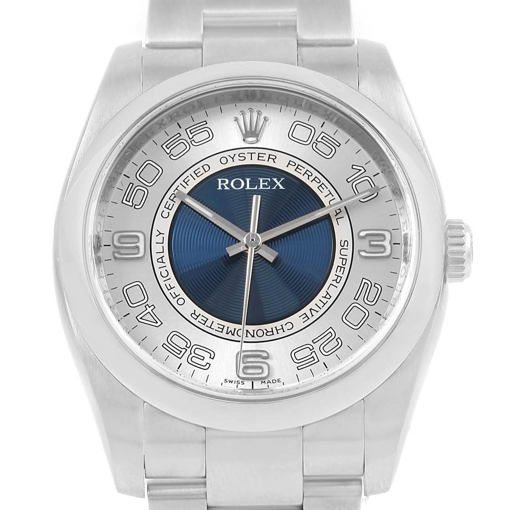 The image shows a frontal view of a Rolex Oyster Perpetual 116000 Men's Stainless Steel Silver Dial 116000 Men's Stainless Steel Silver Dial watch, highlighting its face, bezel, crown, and part of the bracelet.
