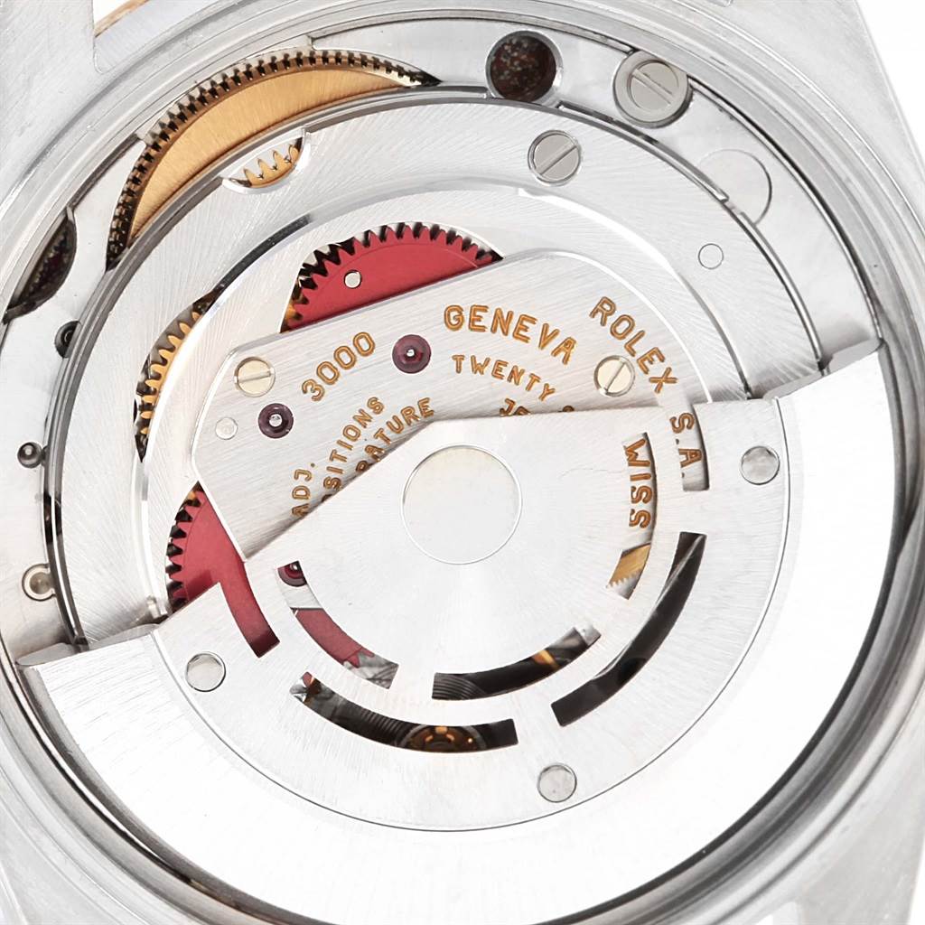 The image shows an angled view of the internal movement mechanism of a Rolex Oyster Perpetual 14233 Men's Steel and Gold (two tone) Champagne Dial 14233 Men's Steel and Gold (two tone) Champagne Dial watch.