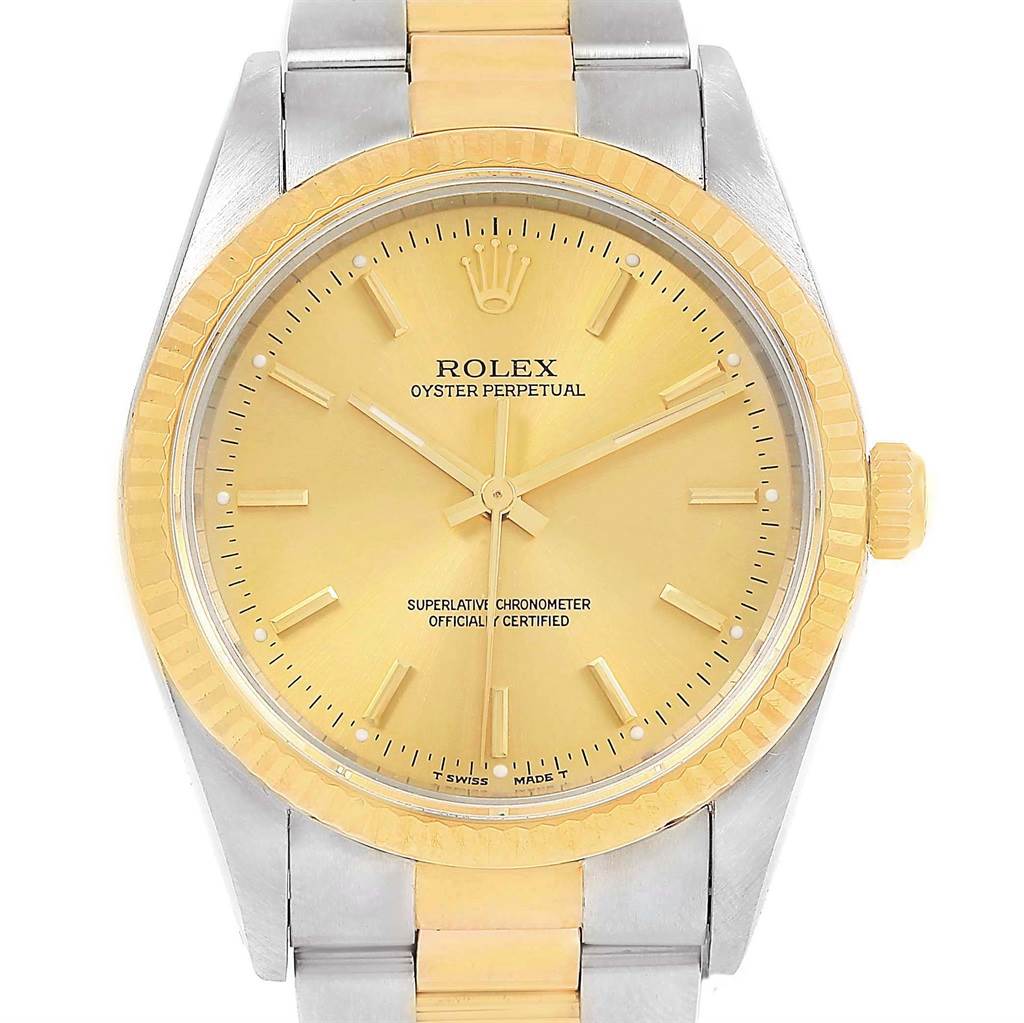This image shows a front view of the Rolex Oyster Perpetual 14233 Men's Steel and Gold (two tone) Champagne Dial 14233 Men's Steel and Gold (two tone) Champagne Dial watch, highlighting its yellow dial, crown, and two-tone bracelet.