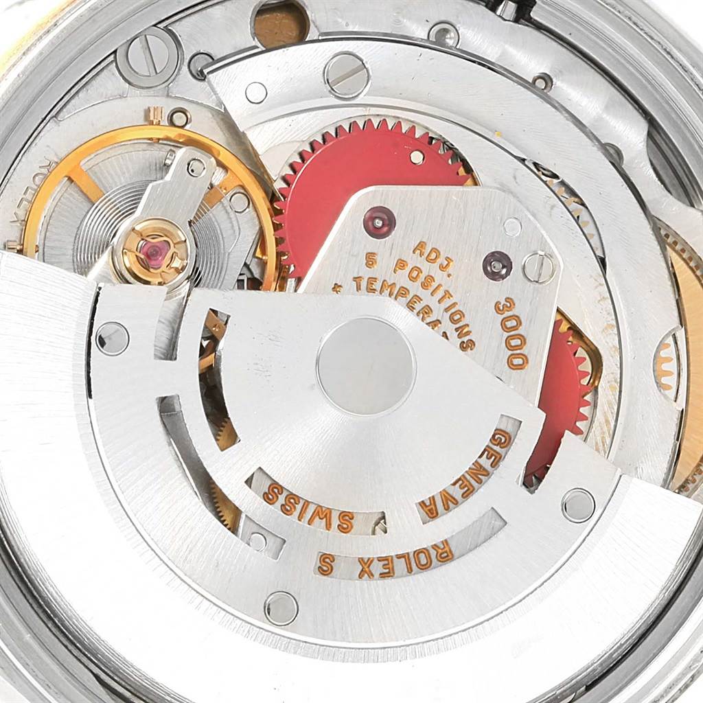 The image shows the internal mechanical movement of a Rolex Oyster Perpetual 14233 Men's Steel and Gold (two tone) Champagne Dial 14233 Men's Steel and Gold (two tone) Champagne Dial watch.