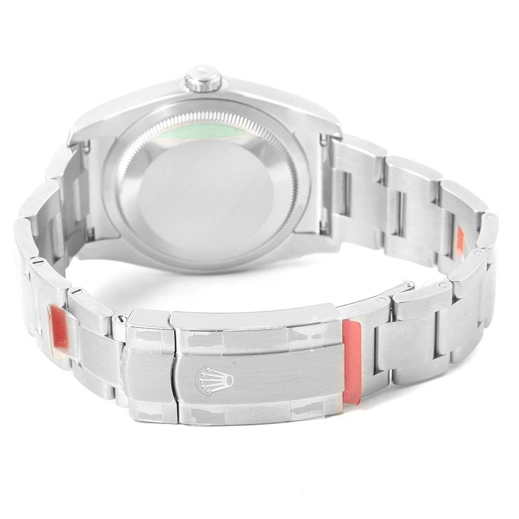 The image shows the back and clasp of a Rolex Oyster Perpetual 116000 Men's Stainless Steel Grey Dial 116000 Men's Stainless Steel Grey Dial watch, focusing on the case back and metal bracelet.