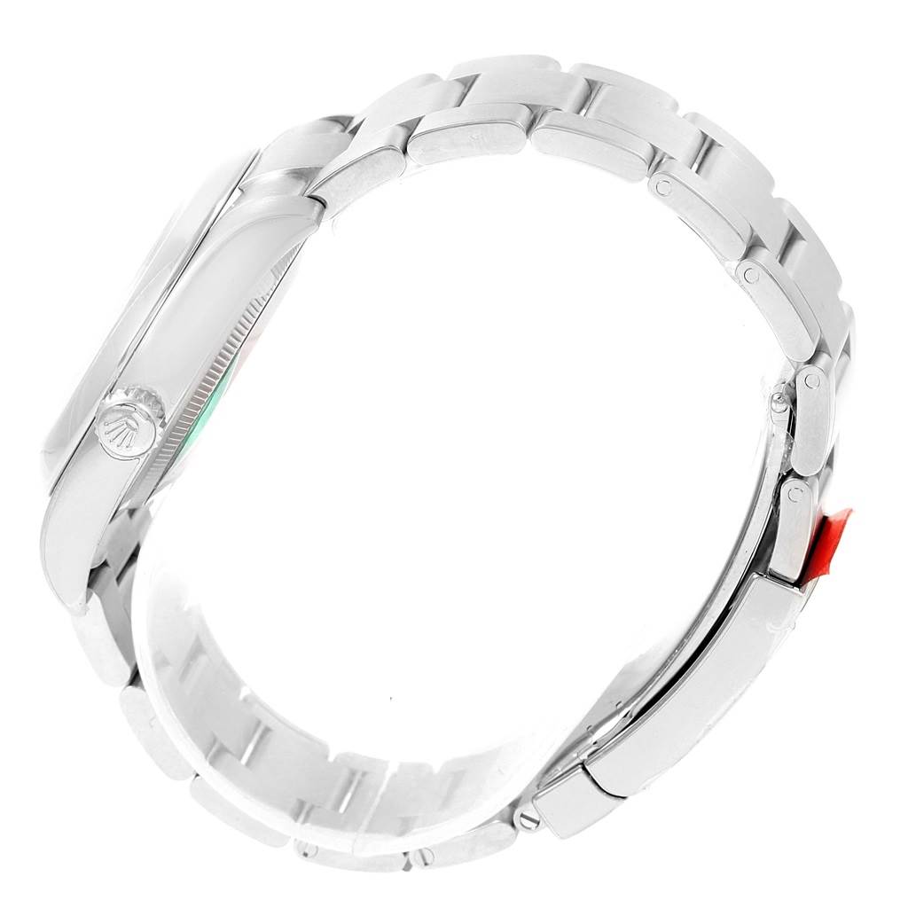 This image shows a side view of the Rolex Oyster Perpetual 116000 Men's Stainless Steel Grey Dial 116000 Men's Stainless Steel Grey Dial watch, highlighting the bracelet and crown.