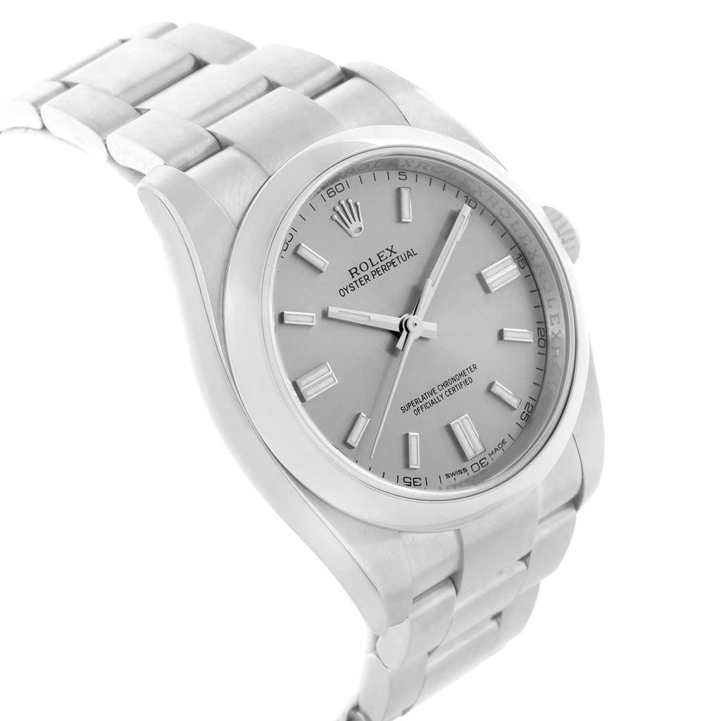 The image shows a side angle of a Rolex Oyster Perpetual 116000 Men's Stainless Steel Grey Dial 116000 Men's Stainless Steel Grey Dial watch, highlighting the face, bezel, crown, and part of the bracelet.