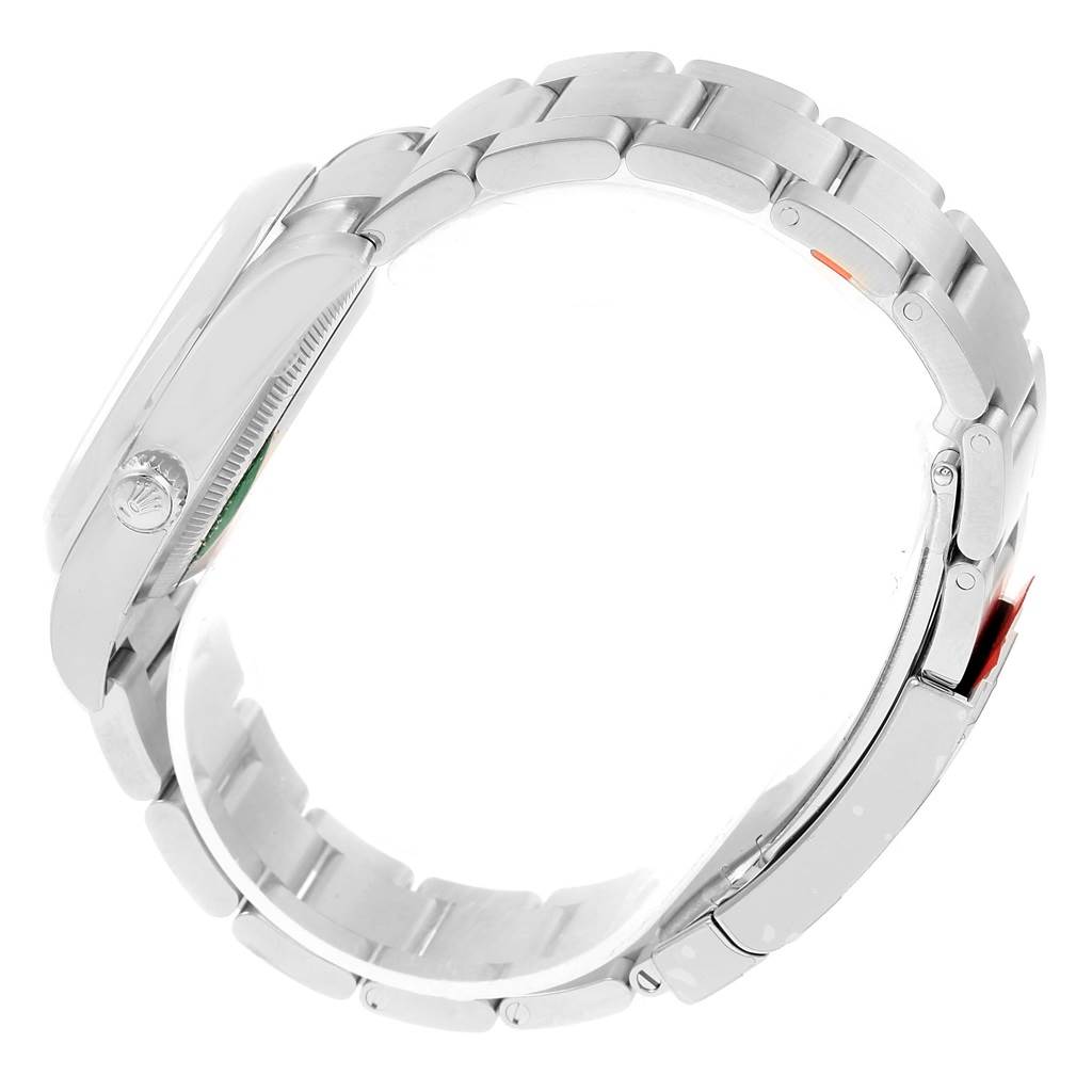 The image shows a side view of a Rolex Oyster Perpetual 116000 Stainless Steel Champagne Dial 116000 Stainless Steel Champagne Dial watch, highlighting the case and bracelet.