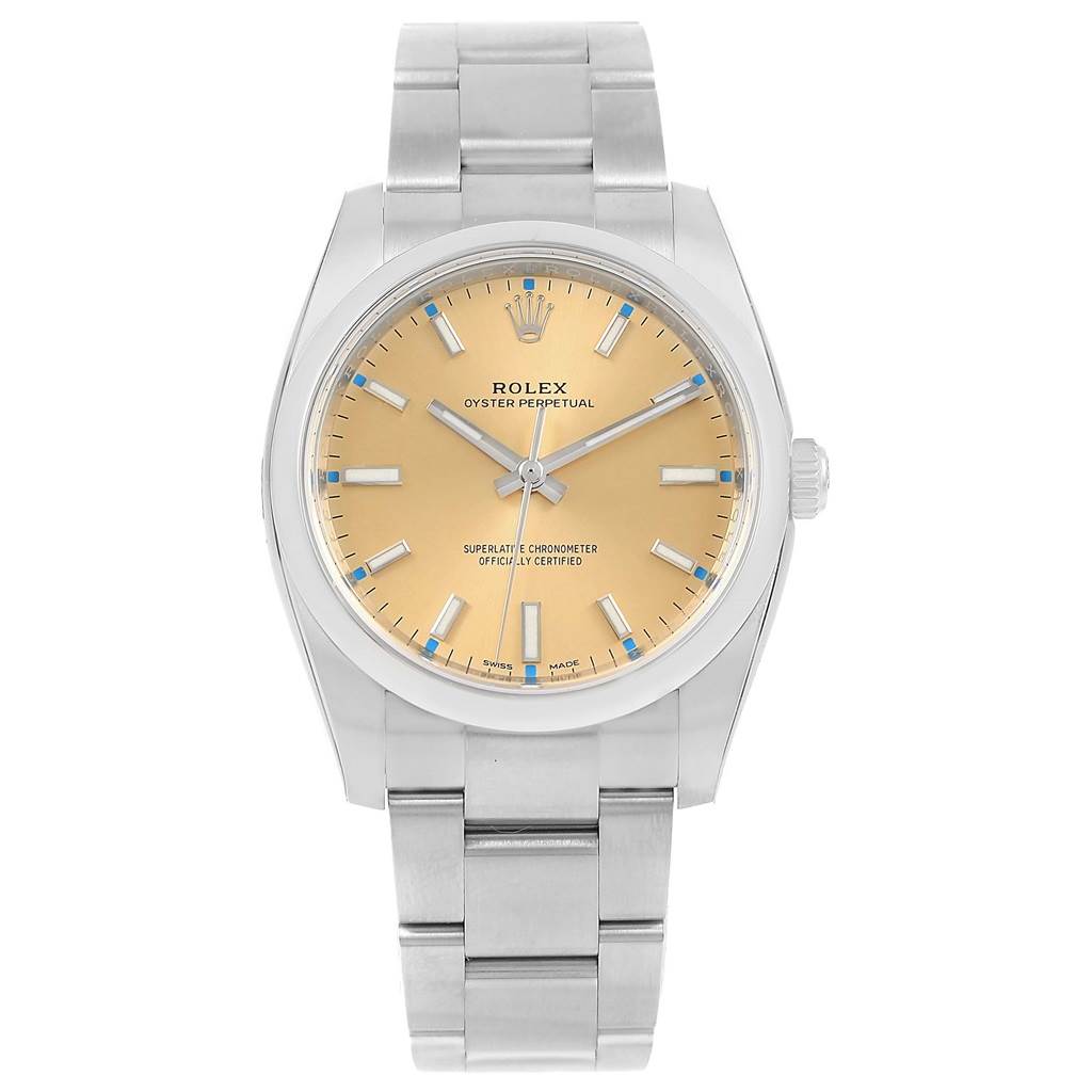 The image shows a front view of the Rolex Oyster Perpetual 116000 Stainless Steel Champagne Dial 116000 Stainless Steel Champagne Dial, highlighting its face, bezel, and stainless steel bracelet.