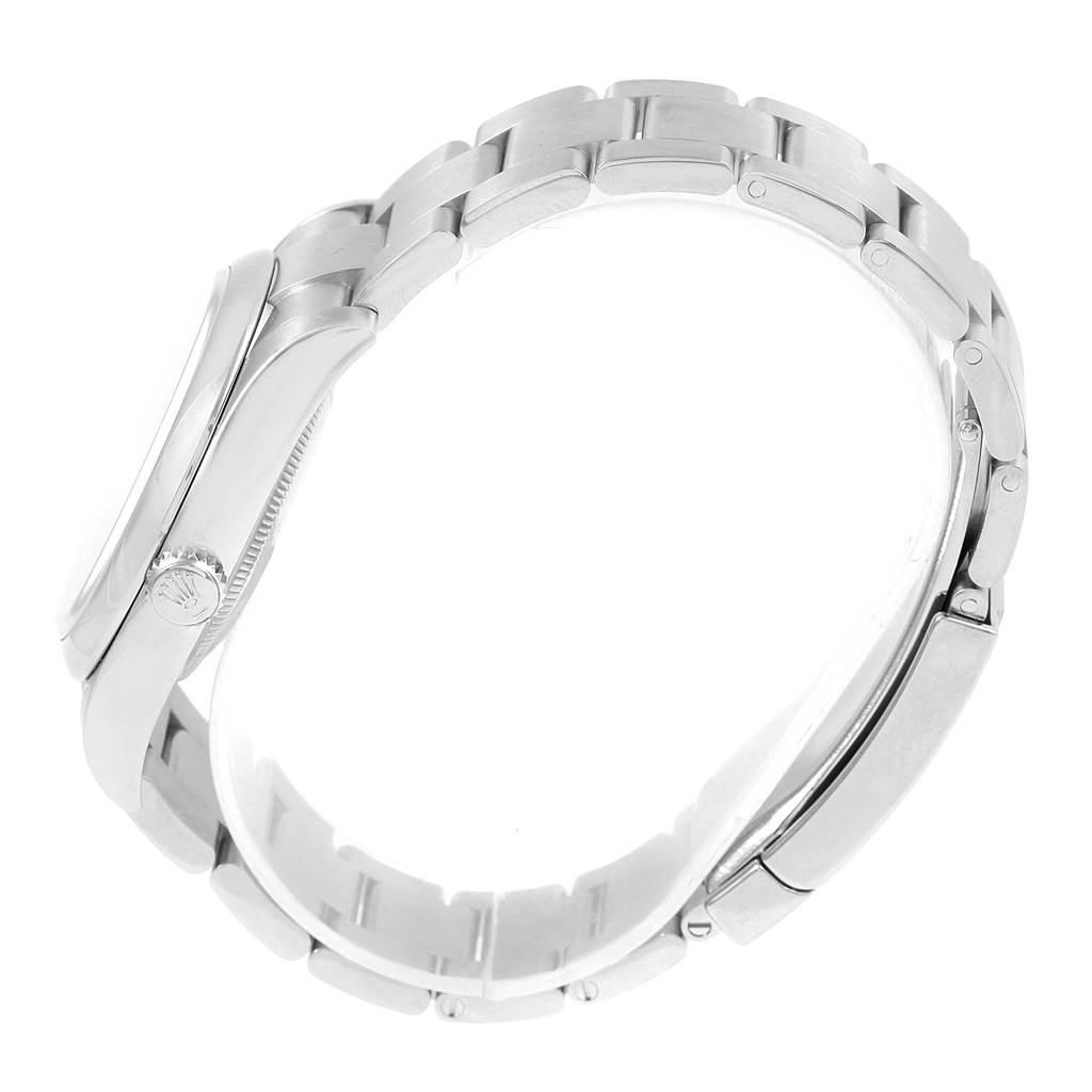 The image shows a side view of the Rolex Oyster Perpetual 116000 Stainless Steel Grey Dial 116000 Stainless Steel Grey Dial watch, highlighting the case, crown, and bracelet.