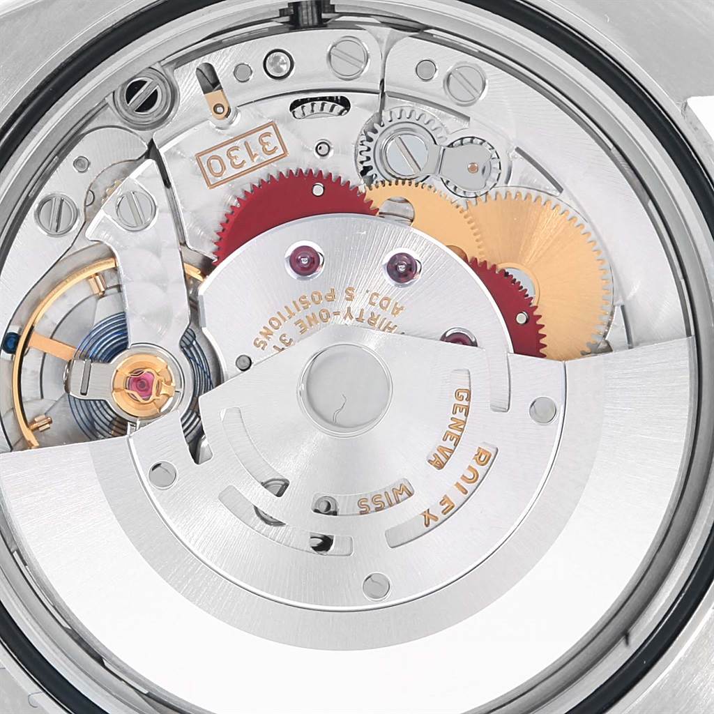 The image shows the movement mechanism of a Rolex Oyster Perpetual 116000 Stainless Steel Grey Dial 116000 Stainless Steel Grey Dial watch from a top-down angle.