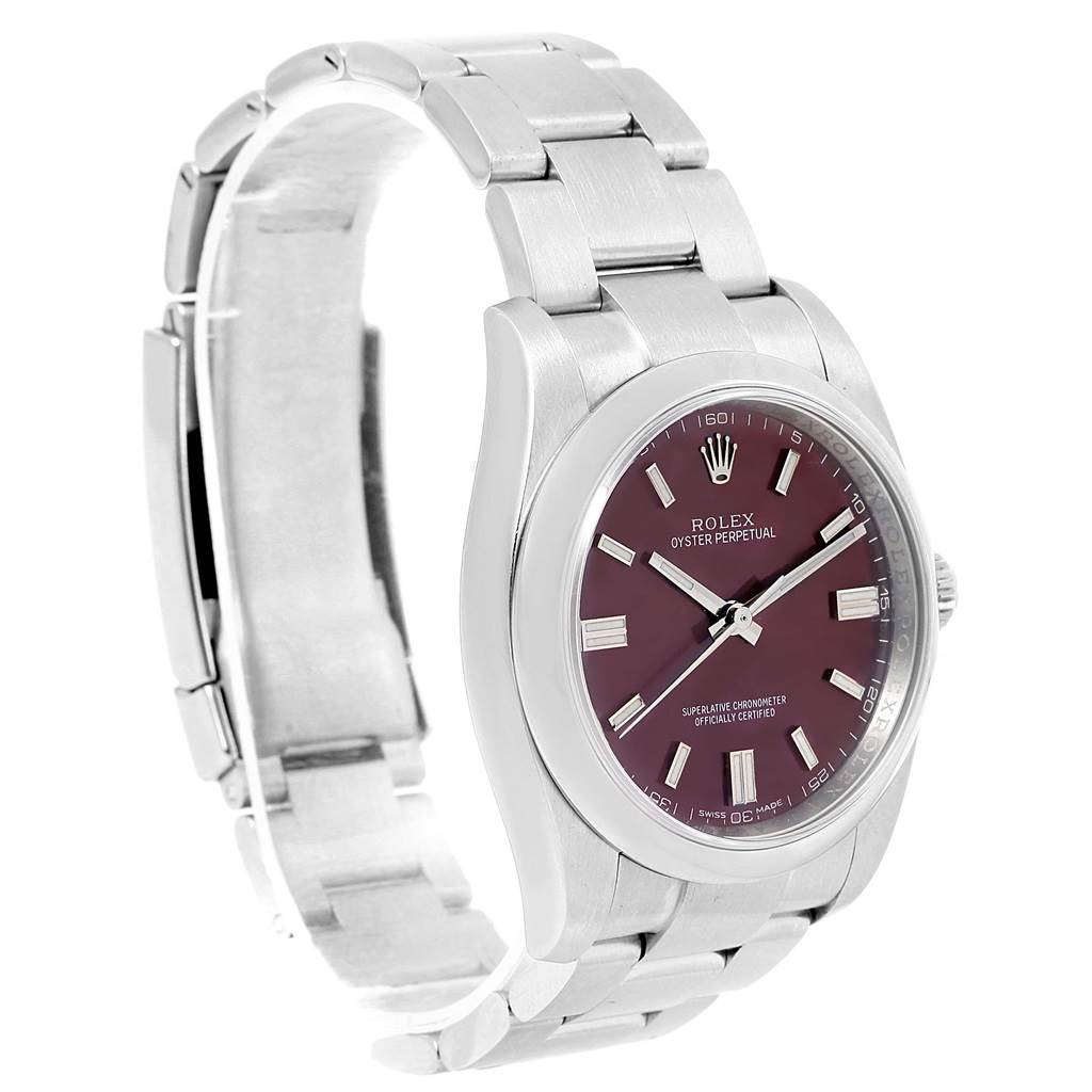 The image shows a Rolex Oyster Perpetual 116000 Stainless Steel Burgundy Dial 116000 Stainless Steel Burgundy Dial watch from an angled side view, capturing the face, bezel, and metal bracelet.