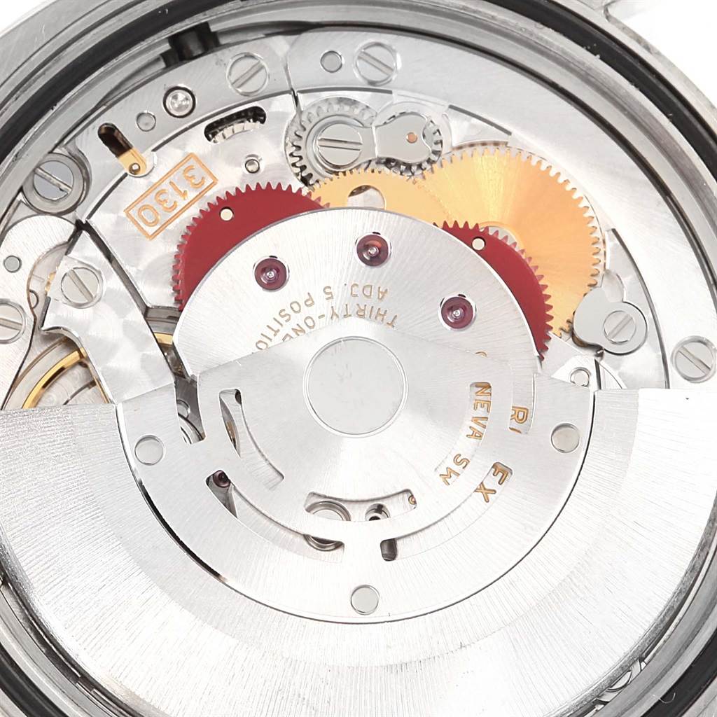 This image shows the internal mechanism and movement components of a Rolex Oyster Perpetual 116000 Stainless Steel Burgundy Dial 116000 Stainless Steel Burgundy Dial watch.